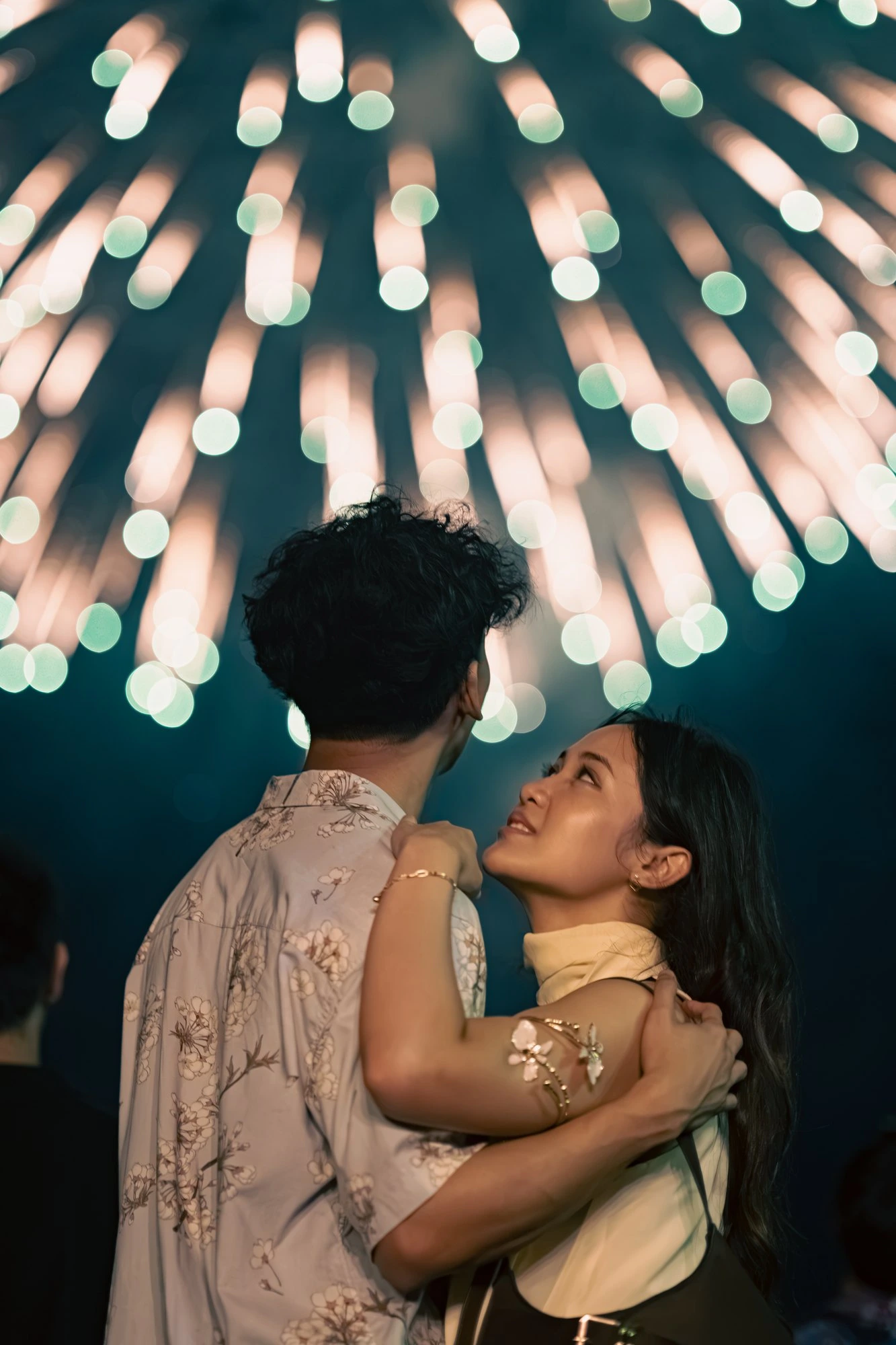 Couples Under Fireworks